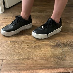 Black Air Force Ones, Women’s 8.5, worn but leather is not scuffed.
